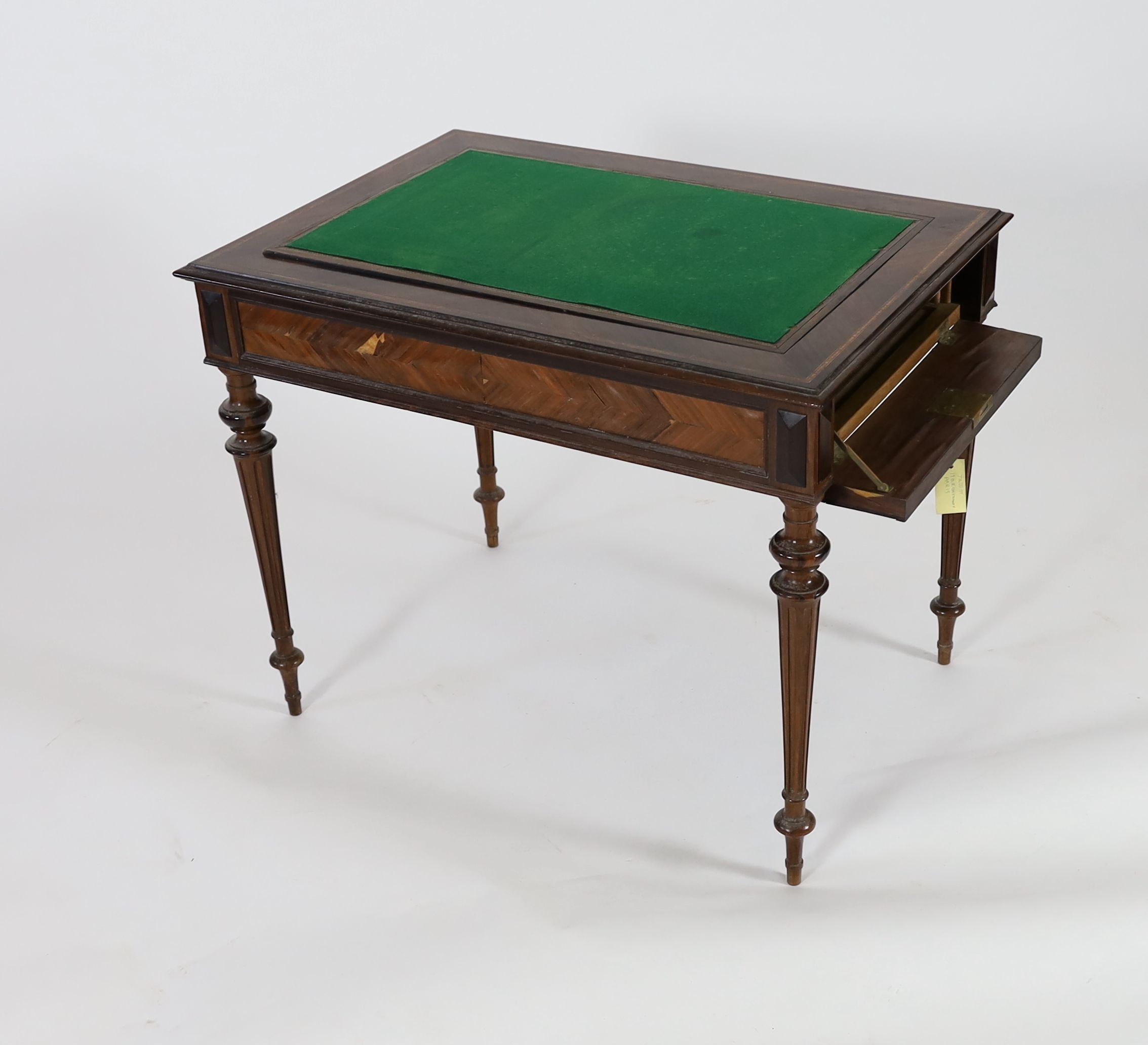 A Napoleon III rosewood games table, by J. A. Jost of Paris, W.92cm D.64cm H.73cm